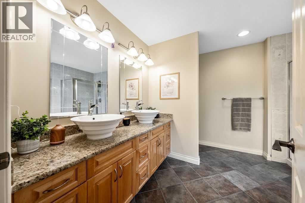 311 Simcrest Heights Sw, Calgary, Alberta  T3H 4K2 - Photo 34 - A2263261