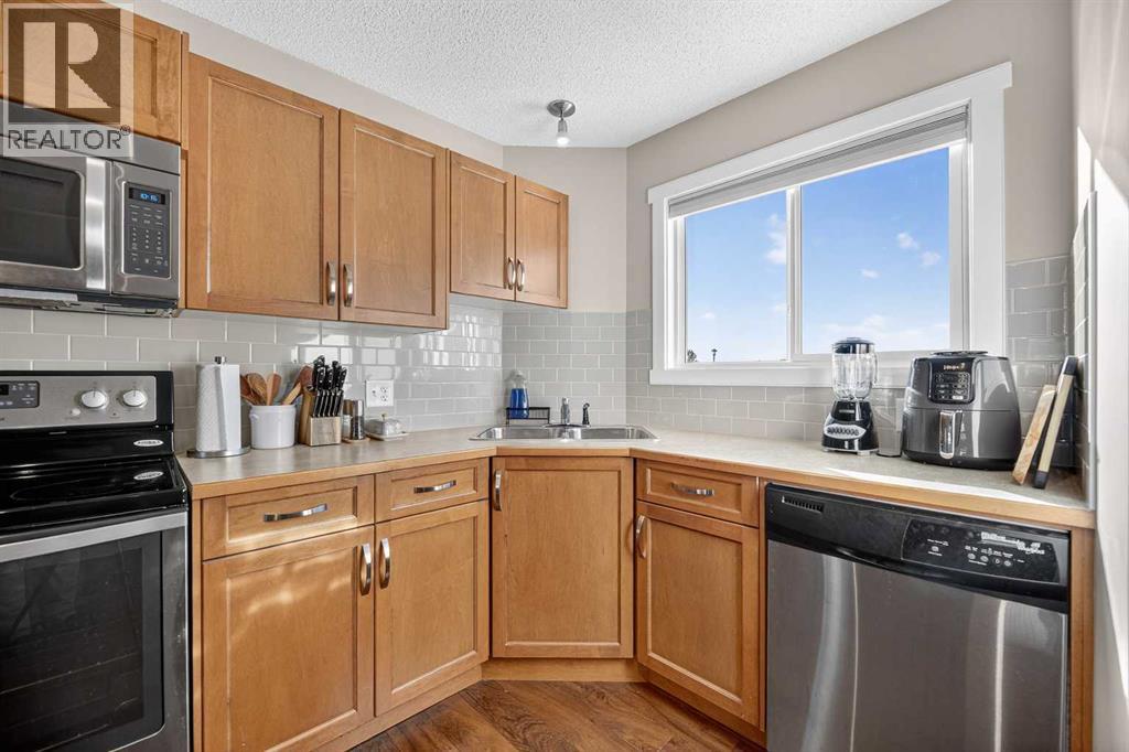 1402 Clover Link, Carstairs, Alberta  T0M 0N0 - Photo 5 - A2262960