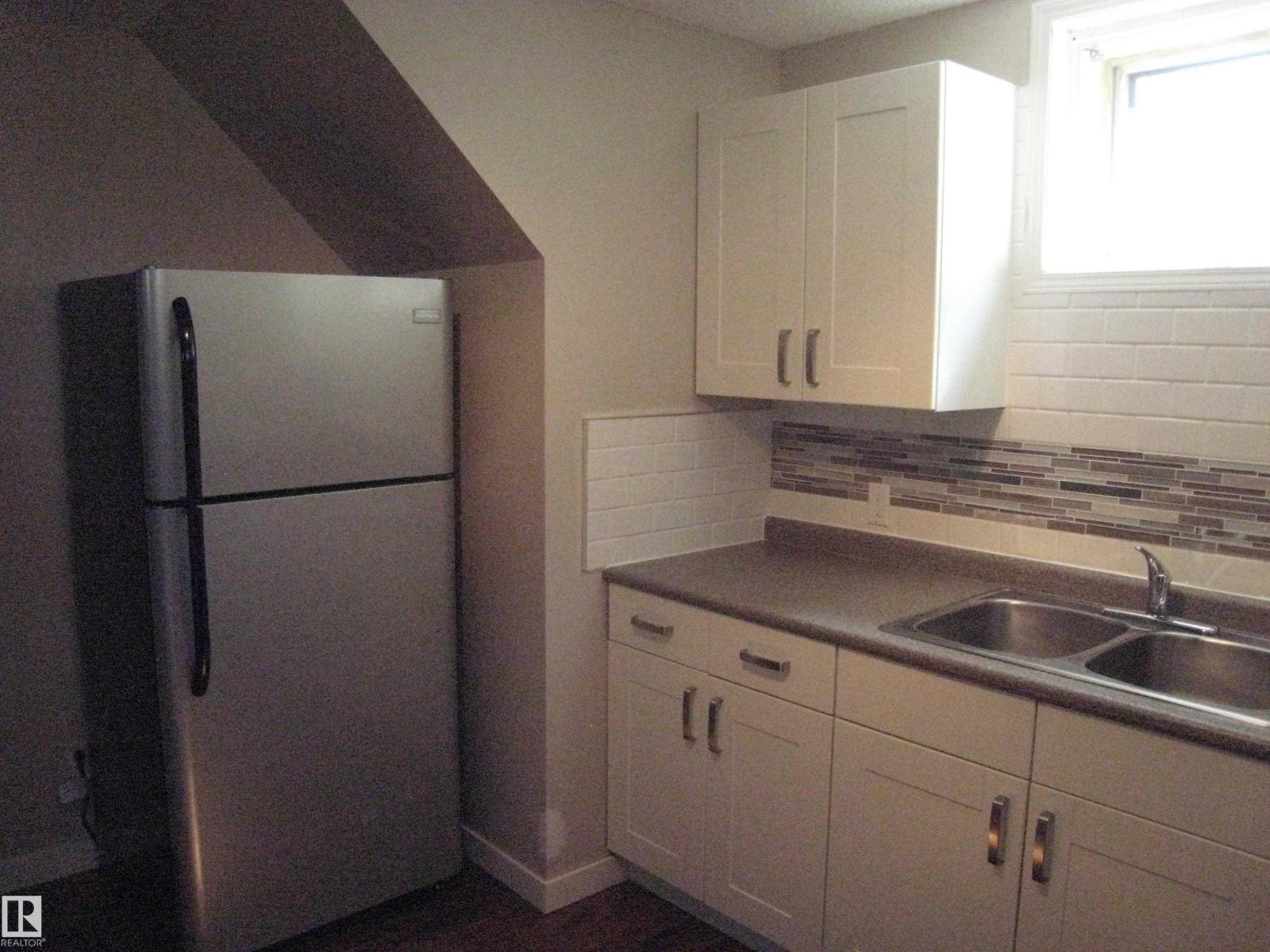 9404 9406 Holyrood Rd Nw, Edmonton, Alberta  T6C 4H4 - Photo 21 - E4461609