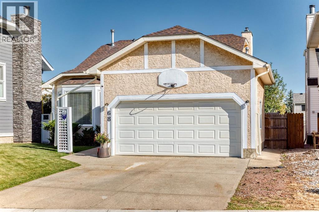 68 Woodmark Crescent Sw, Calgary, Alberta  T2w 4z2 - Photo 2 - A2263557