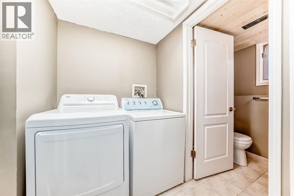 68 Woodmark Crescent Sw, Calgary, Alberta  T2w 4z2 - Photo 38 - A2263557