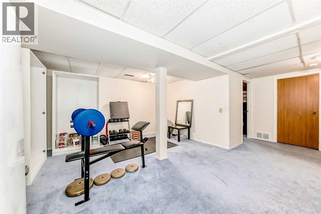 68 Woodmark Crescent Sw, Calgary, Alberta  T2w 4z2 - Photo 39 - A2263557