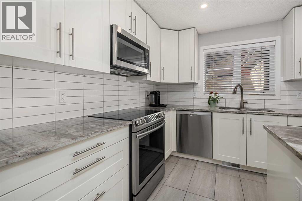 703 20 Avenue Nw, Calgary, Alberta  T2M 1E2 - Photo 7 - A2263007
