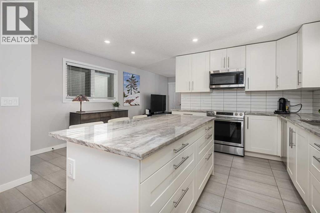 703 20 Avenue Nw, Calgary, Alberta  T2M 1E2 - Photo 9 - A2263007