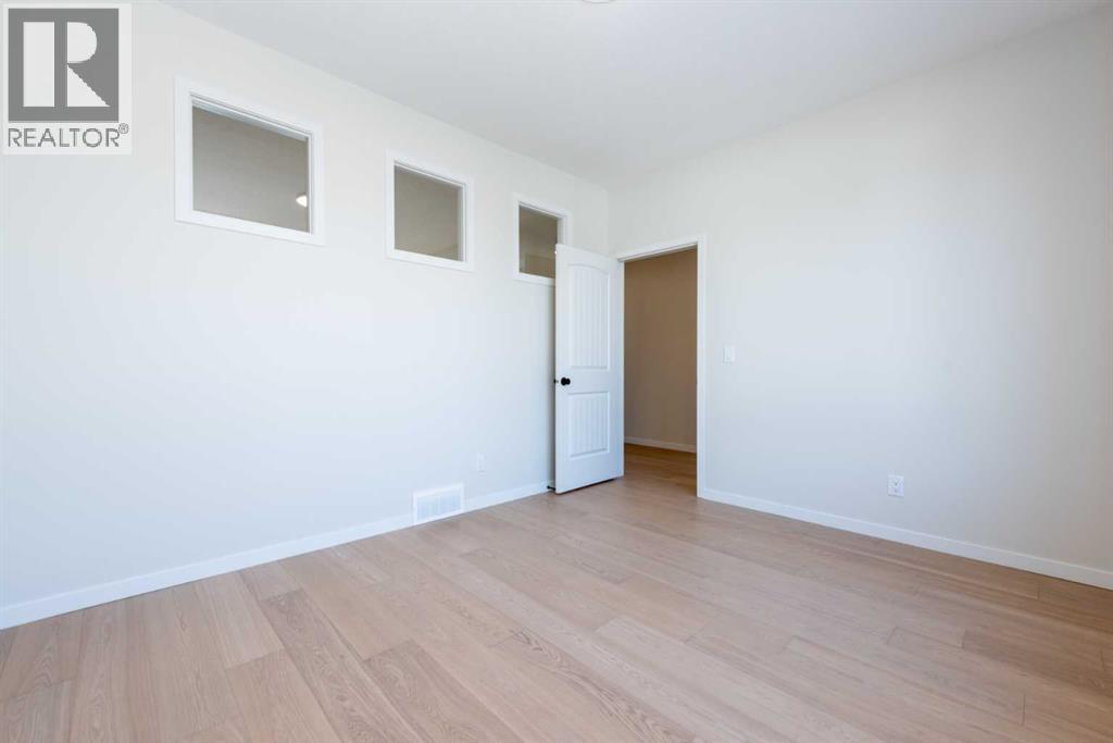 264 Marmot Grove Nw, Calgary, Alberta  T3J 2J5 - Photo 9 - A2260366
