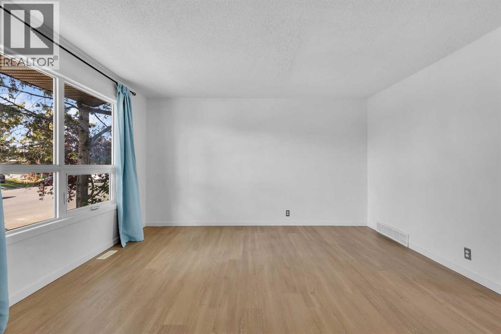 20 Whitmire Road Ne, Calgary, Alberta  T1Y 5X5 - Photo 6 - A2258604