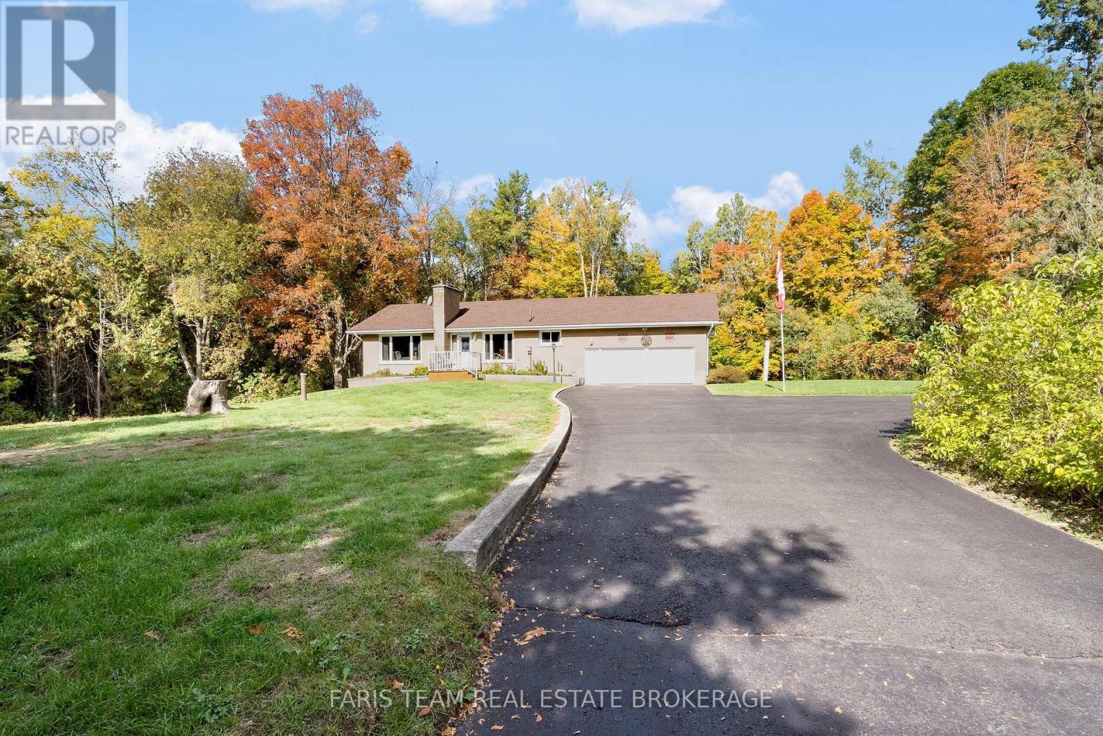 2826 Horseshoe Valley Road W, Springwater, Ontario  L0L 2K0 - Photo 4 - S12455978