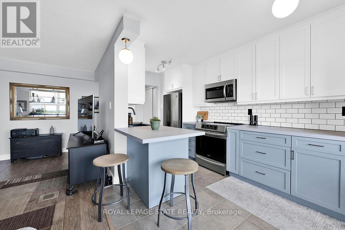 708 - 6390 Huggins Street, Niagara Falls, Ontario  L2J 1H1 - Photo 2 - X12456184