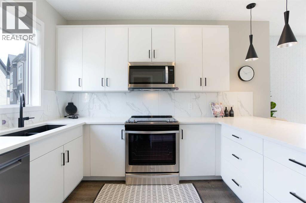 896 Belmont Drive Sw, Calgary, Alberta  T2X 0C6 - Photo 4 - A2224181