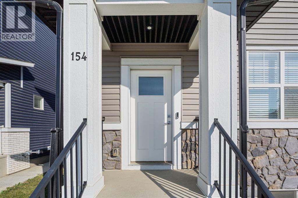 154 Creekside Drive Sw, Calgary, Alberta  T2X 4A8 - Photo 3 - A2259361