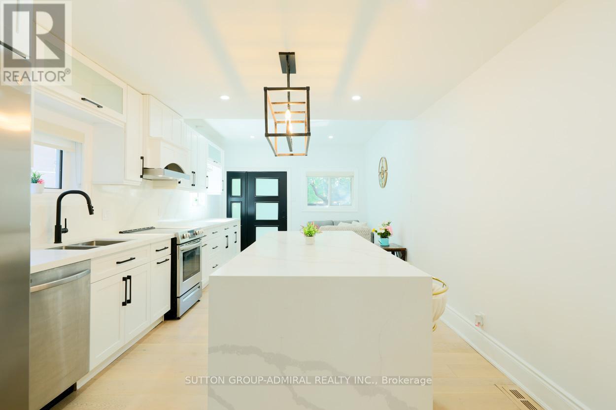 70 Carlaw Avenue, Toronto, Ontario  M4M 2R7 - Photo 15 - E12456212