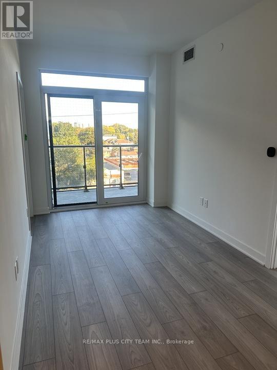 302 - 1007 The Queensway, Toronto, Ontario  M8Z 0C6 - Photo 2 - W12456323