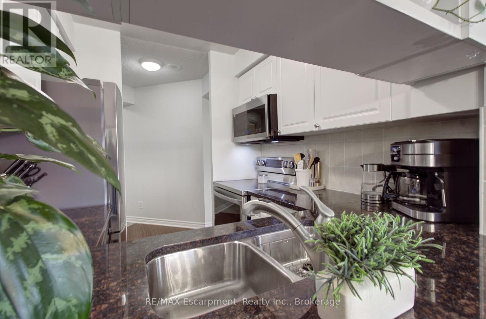 311 - 2325 Central Park Drive, Oakville, Ontario  L6H 0E2 - Photo 14 - W12456484