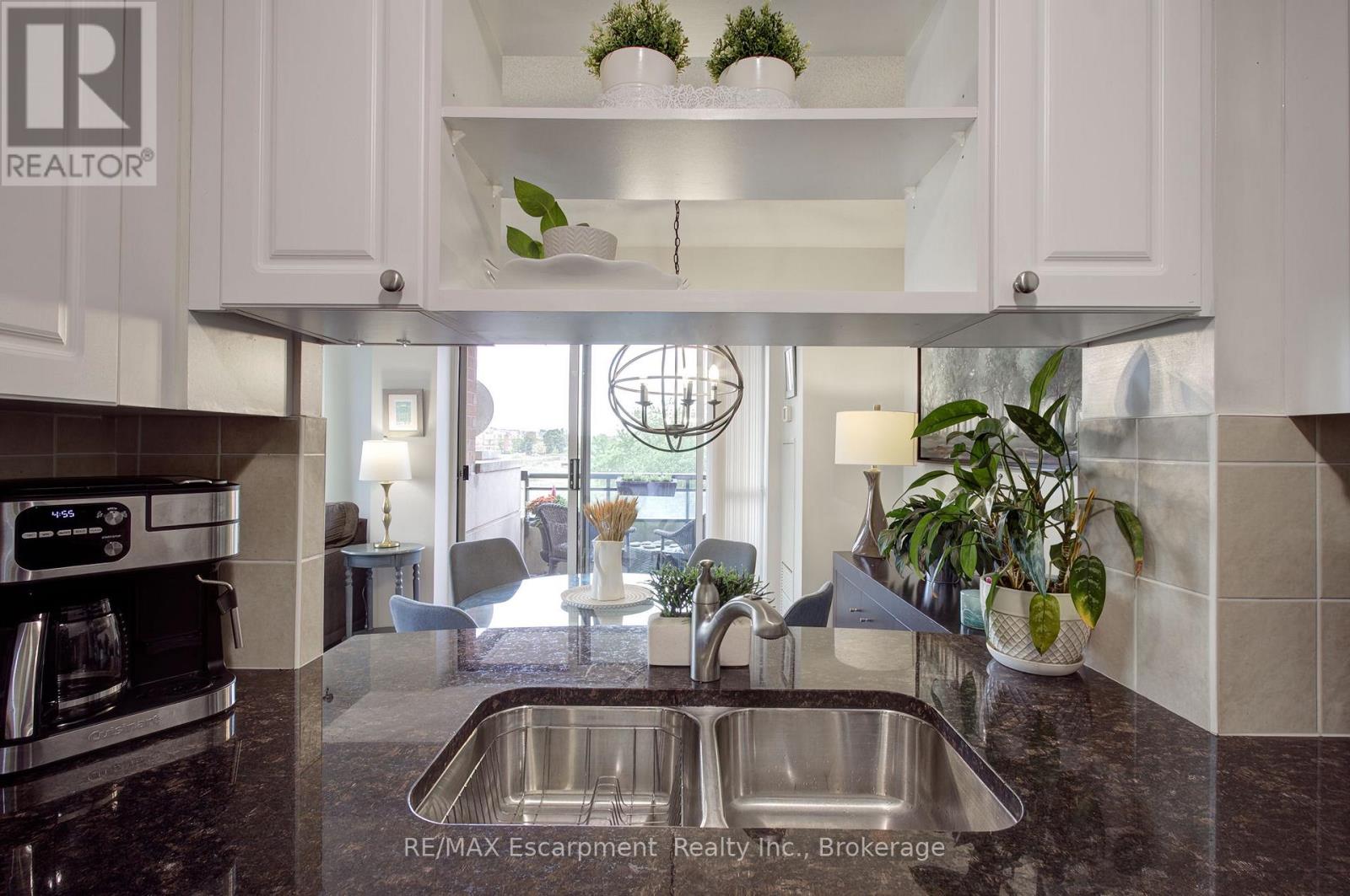 311 - 2325 Central Park Drive, Oakville, Ontario  L6H 0E2 - Photo 9 - W12456484