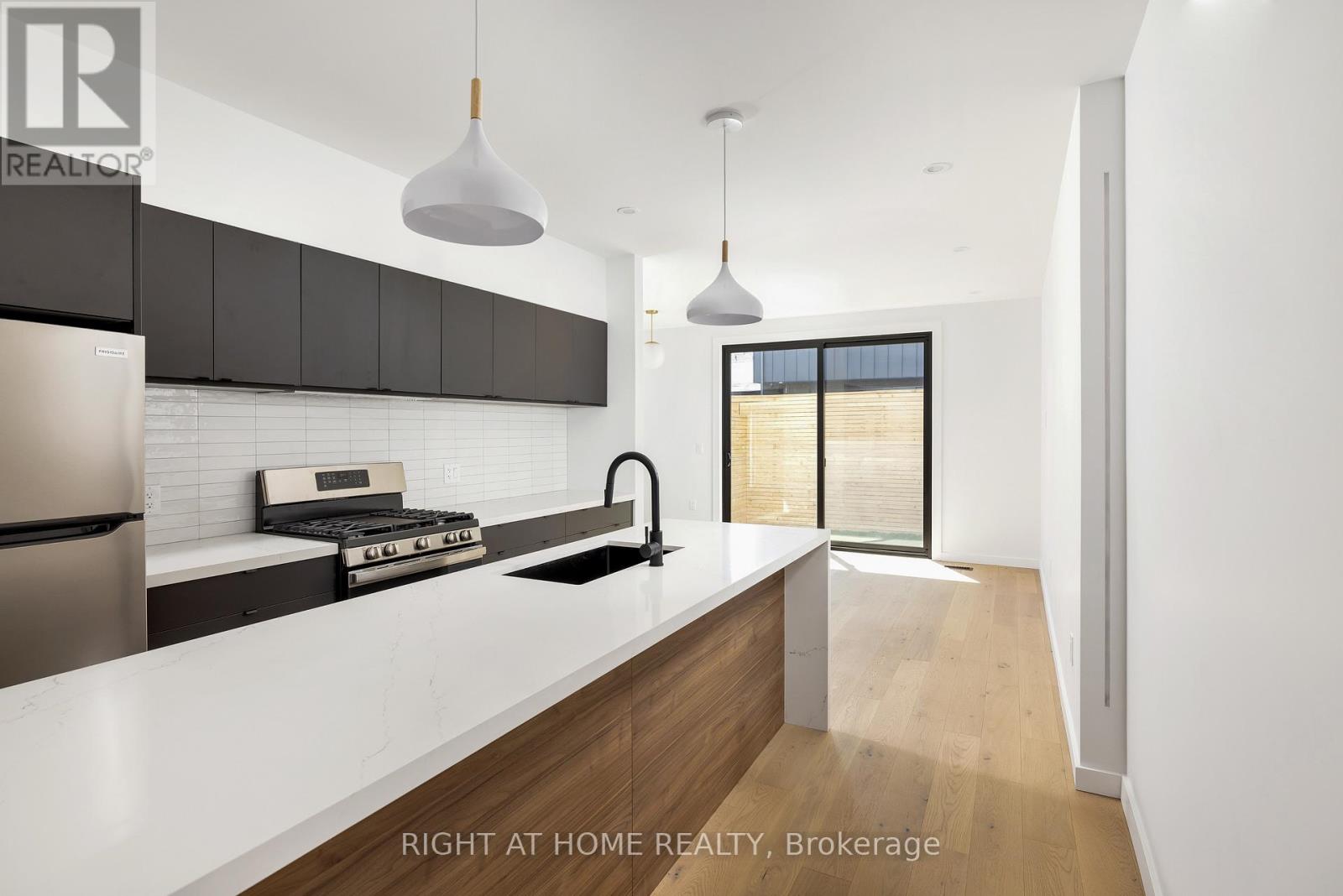 Unit #2 - 86 Lansdowne Avenue, Toronto, Ontario  M6K 2V9 - Photo 2 - W12454179
