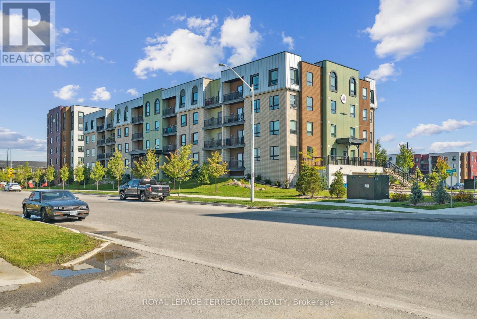 102 - 6 Spice Way, Barrie, Ontario  L9J 0J9 - Photo 1 - S12456661
