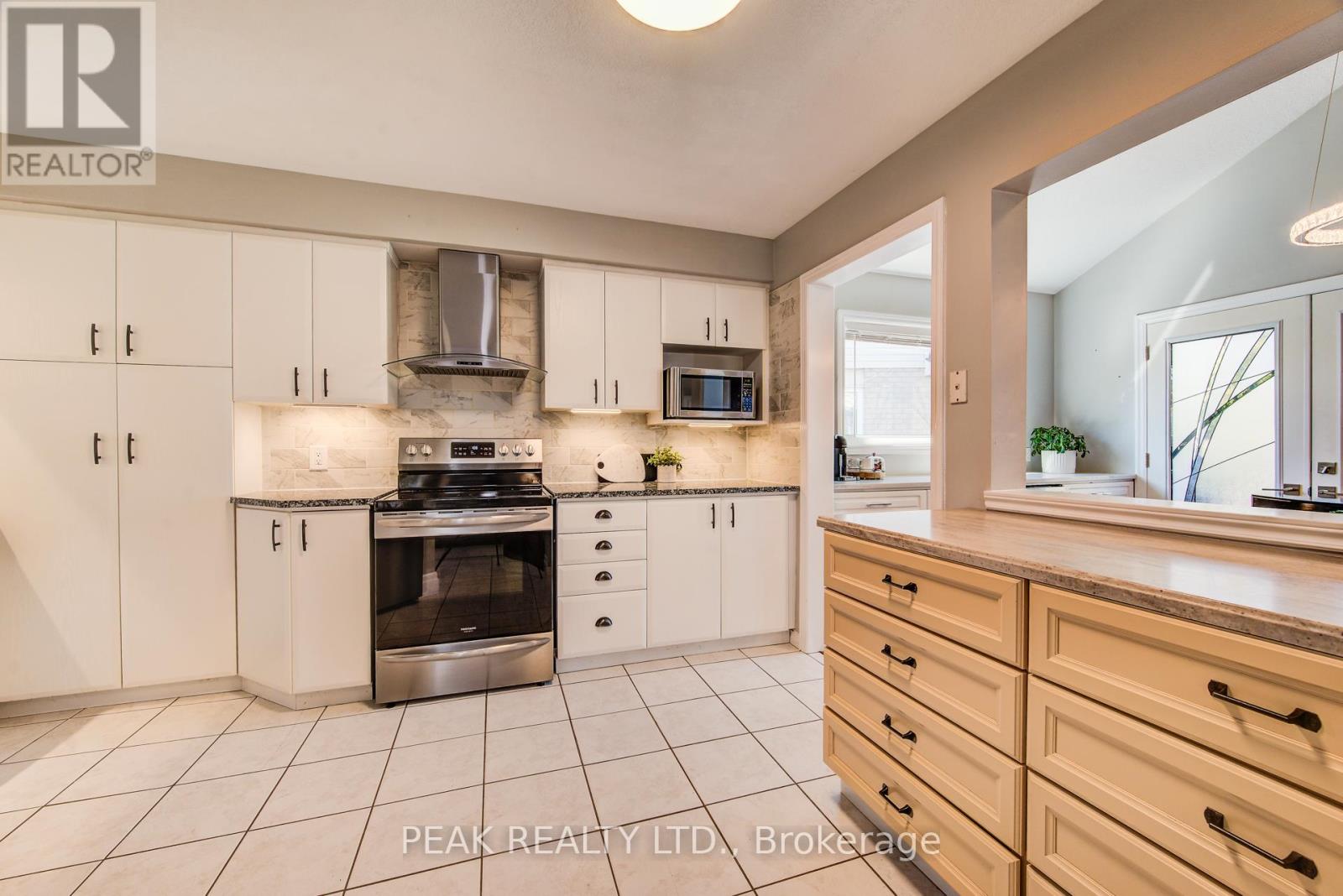 413 Hidden Creek Drive, Kitchener, Ontario  N2N 3N2 - Photo 7 - X12456747