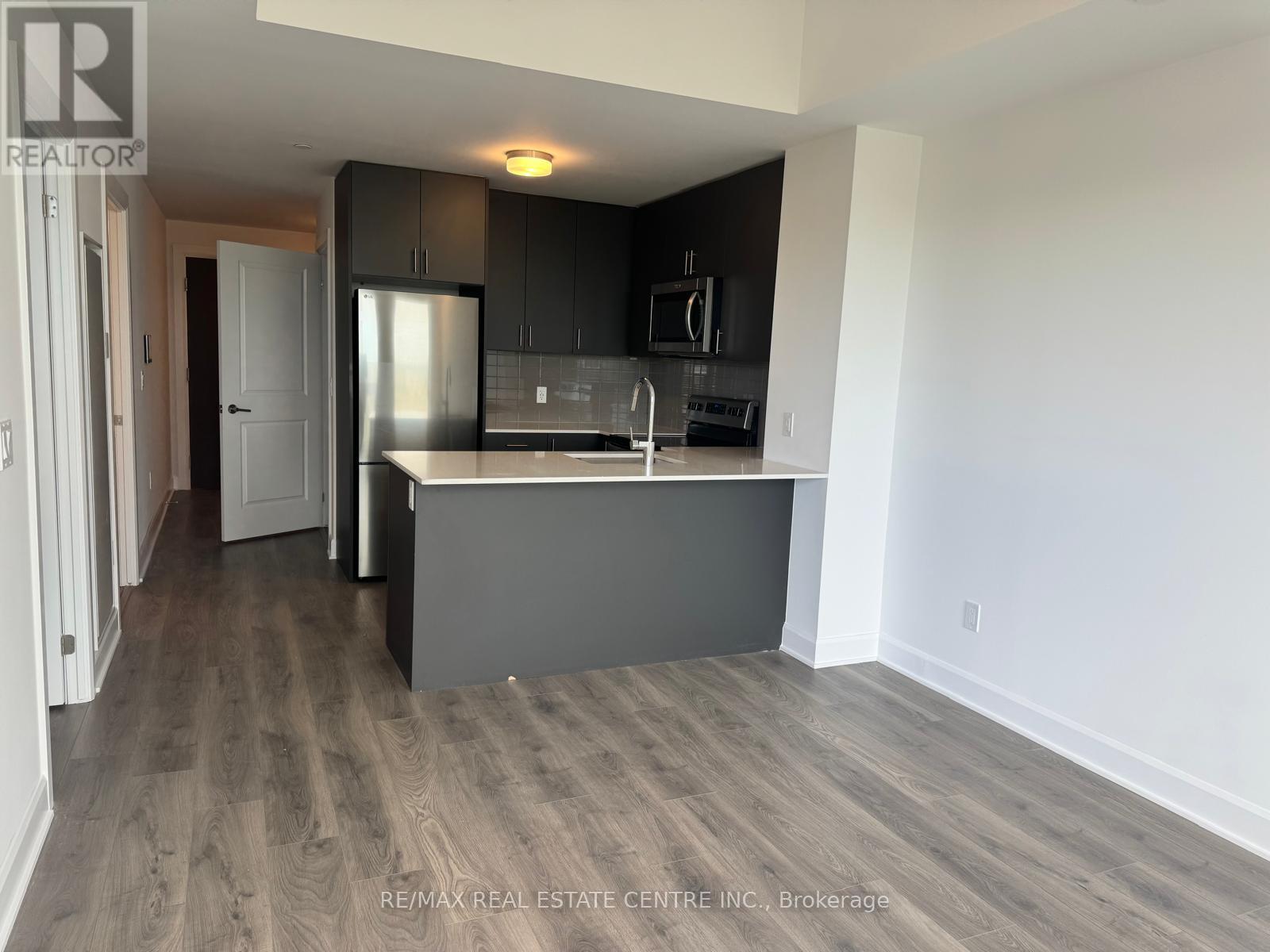 1211 - 3240 William Coltson Avenue, Oakville, Ontario  L6H 8C8 - Photo 12 - W12456160