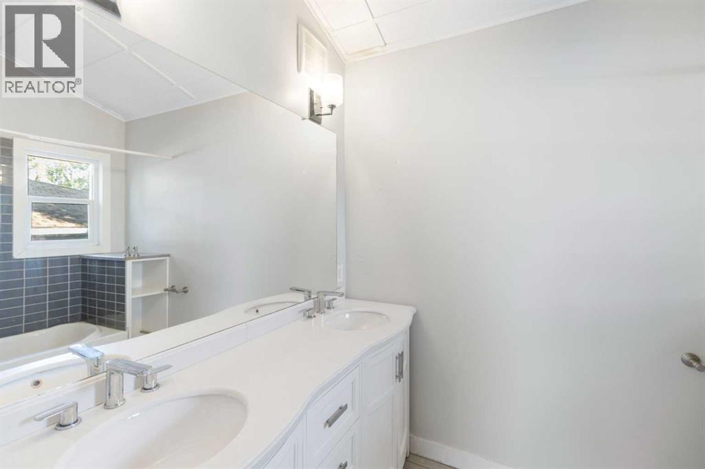 4 Heston Street Nw, Calgary, Alberta  T2K 2C1 - Photo 28 - A2257295