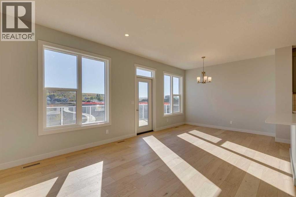 143 Creekstone Green Sw, Calgary, Alberta  T2X 5W5 - Photo 6 - A2248019