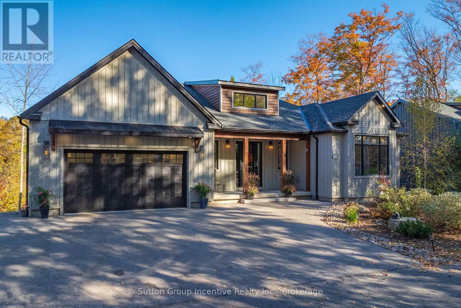 Welcome to one of the newest listings in Deerhurst Highlands, with over 3,000 sq ft of finished luxury space. Avoid the dust, construction, and highway noise; instead, join this established street, which is one of the best-kept secrets in the development. Compare this home to the same model of new construction, with over $250,000+ in added value. It may make perfect sense to opt for this pristine 4-year-old home, a move-in-ready property with a Multi-Million-Dollar View. Well-chosen high-end finishes, including an extended deck off the dining room, a finished walk-out basement, luxury vinyl plank flooring throughout, new blinds (some with power), thoughtful landscaping, and smart space-saving add-ons and recreational details like a Hot Tub, may make the decision easier. Please take a look at how this home feels like your home the moment you walk in. The long golf view is immediate!  Enjoy the view from the Primary Bedroom. Imagine Waking up to that View! 3+1 Bedrooms and 2+1 Baths, the large suite on the main floor and walk-out level enjoys all the comforts of a luxury home. The two guest bedrooms are located at the front of the home for privacy and are serviced by a large bathroom. The opulent kitchen overlooks the dining and living room areas, featuring a walk-in pantry, an entertainer's built-in and a dance floor-worthy space. Imagine the fun you, your family, and your friends can have in your new home.  Remember, it is tucked back on a quiet Street backing onto the prettiest fairway. The prestigious Highlands Golf Course is situated in the heart of one of the best resort neighbourhoods, close to the Vibrant Town of Huntsville. This off-water home is conveniently located near Pen, Fairy, and Vernon Lakes, with over 40 miles of boating and snowmobiling trails to explore. It is within viewing distance of the Downhill ski lodge of Hidden Valley. This model has an ample garage with parking for three, or create a workshop in addition to parking two cars inside! (id:48254)