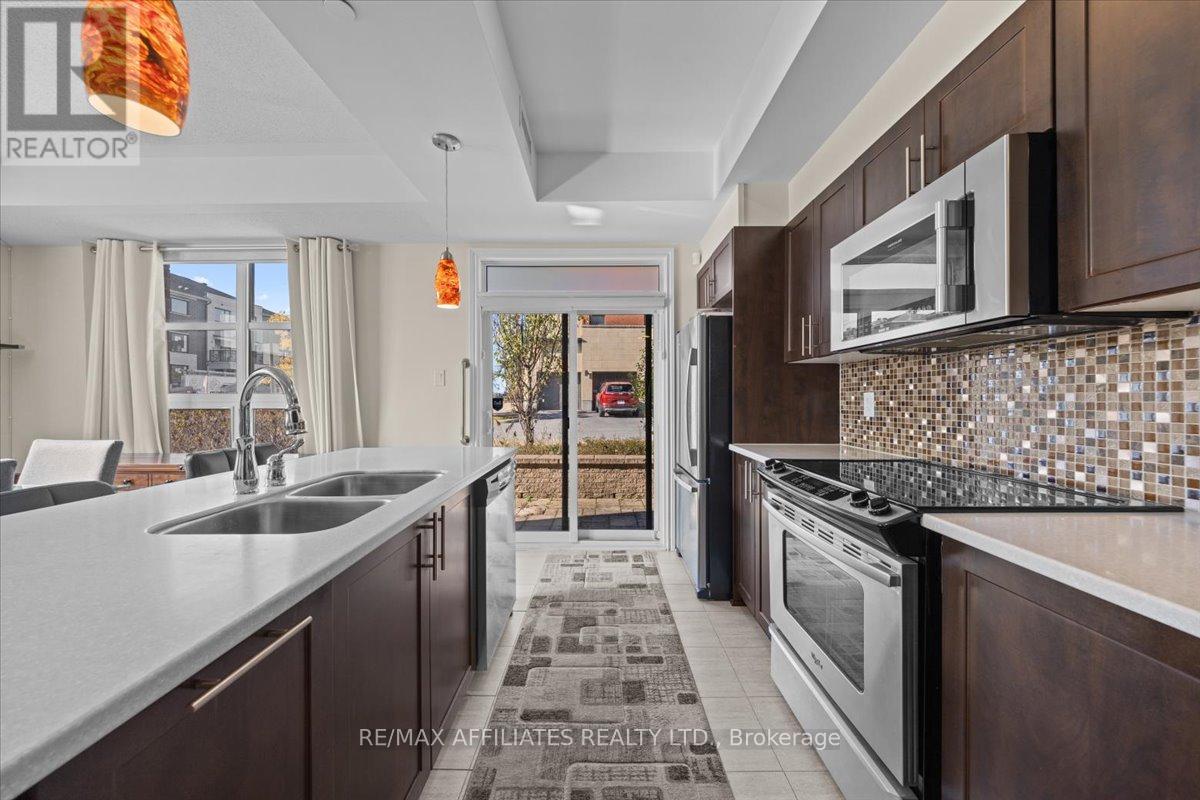 105 - 250 Glenroy Gilbert Drive, Ottawa, Ontario  K2J 5W2 - Photo 12 - X12457005
