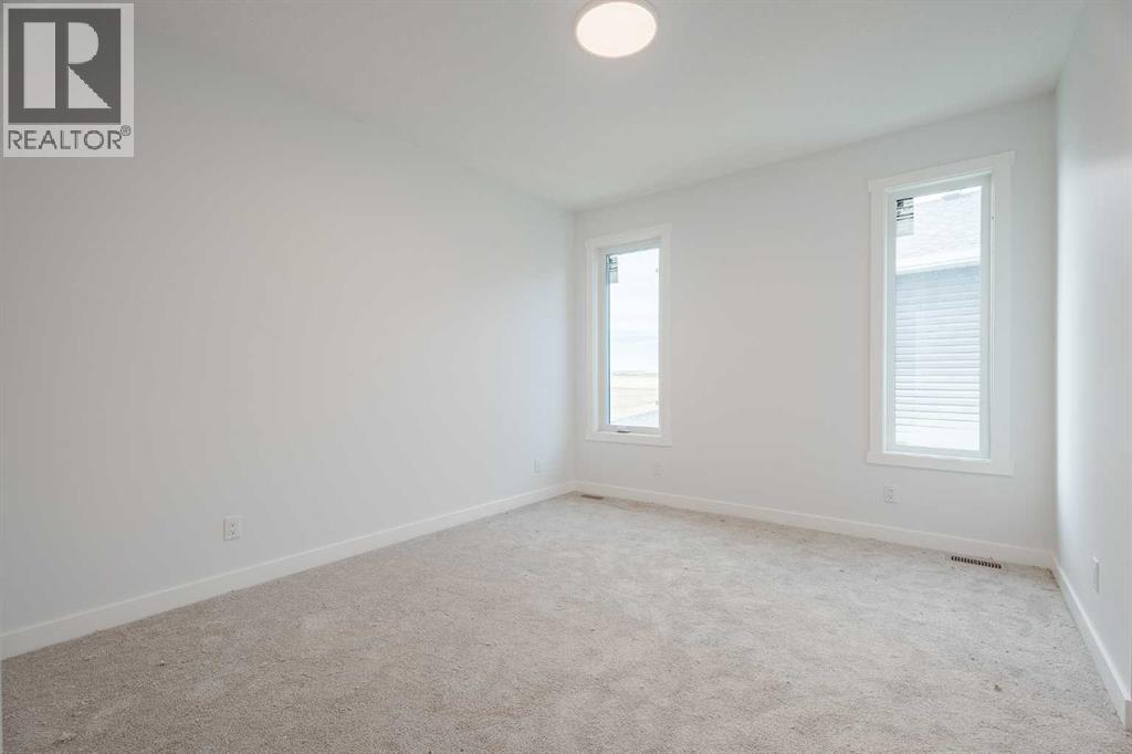 1427 Scarlett Ranch Boulevard, Carstairs, Alberta  T0M 0N0 - Photo 28 - A2262985