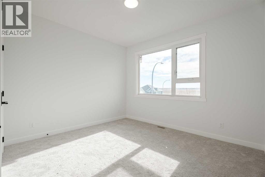 1427 Scarlett Ranch Boulevard, Carstairs, Alberta  T0M 0N0 - Photo 31 - A2262985