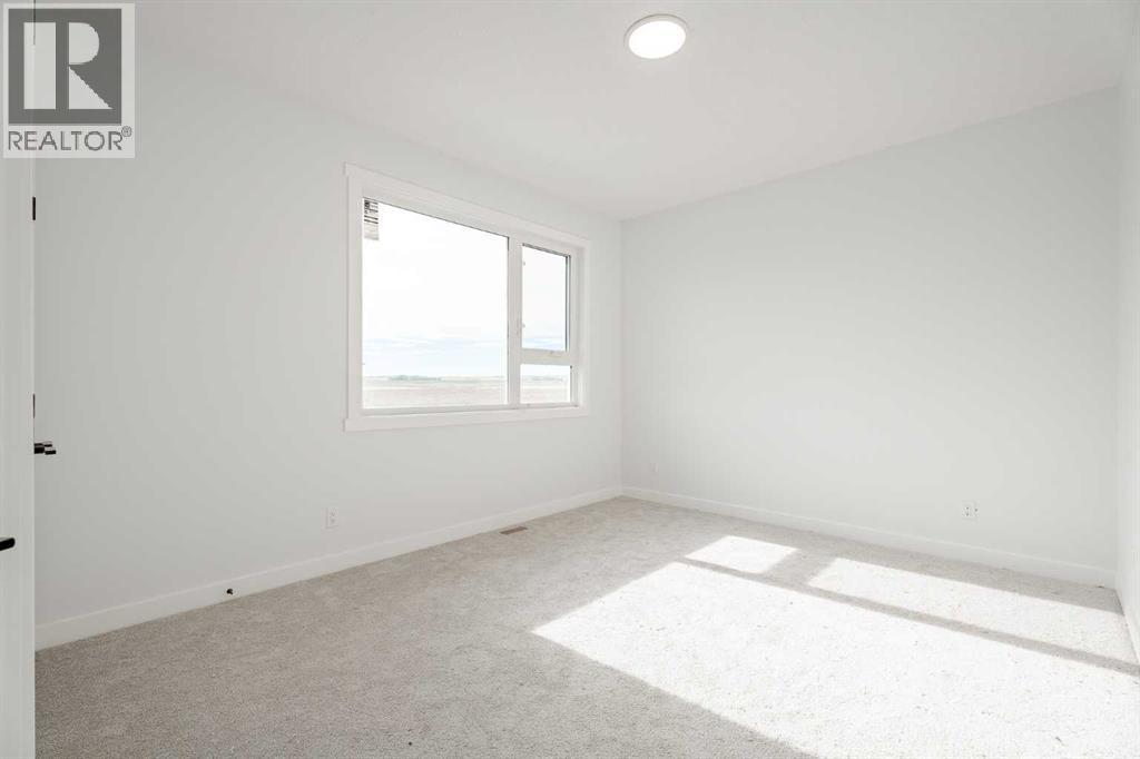 1427 Scarlett Ranch Boulevard, Carstairs, Alberta  T0M 0N0 - Photo 32 - A2262985