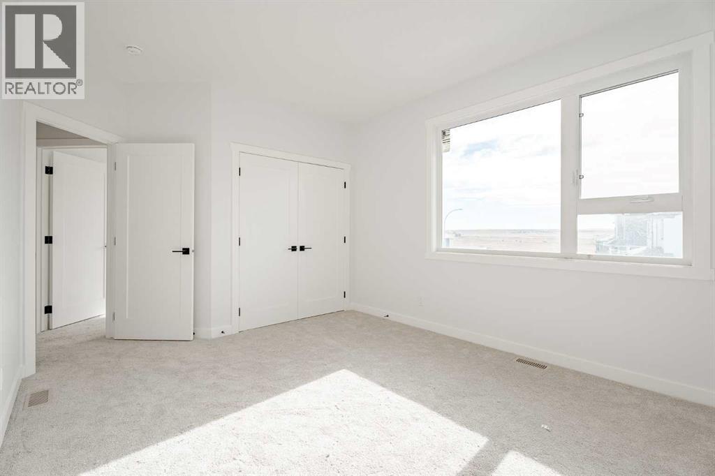 1427 Scarlett Ranch Boulevard, Carstairs, Alberta  T0M 0N0 - Photo 33 - A2262985