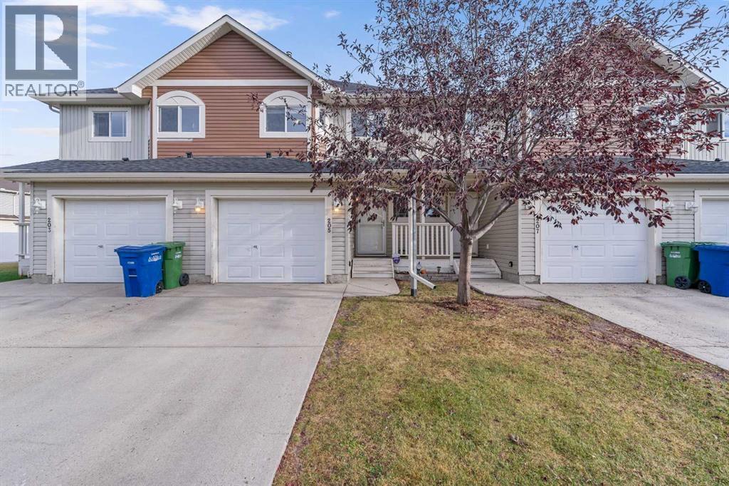 205 Bayside Point Sw, Airdrie, Alberta  T4B 2X6 - Photo 2 - A2263209