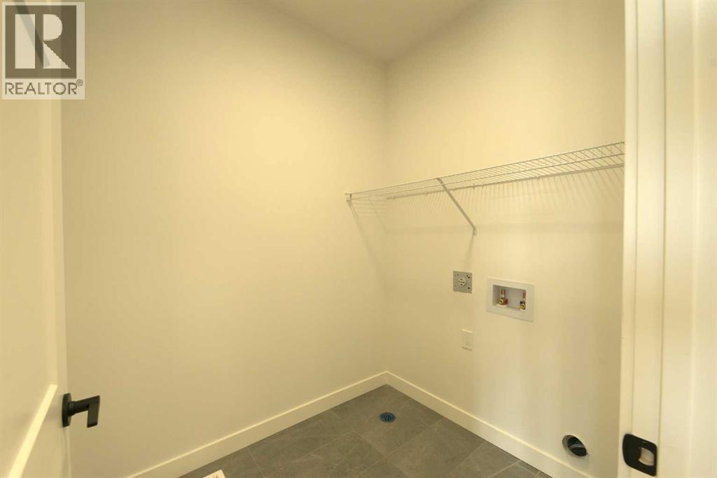 1117 Iron Ridge Avenue, Crossfield, Alberta  T0M 0S0 - Photo 10 - A2253391