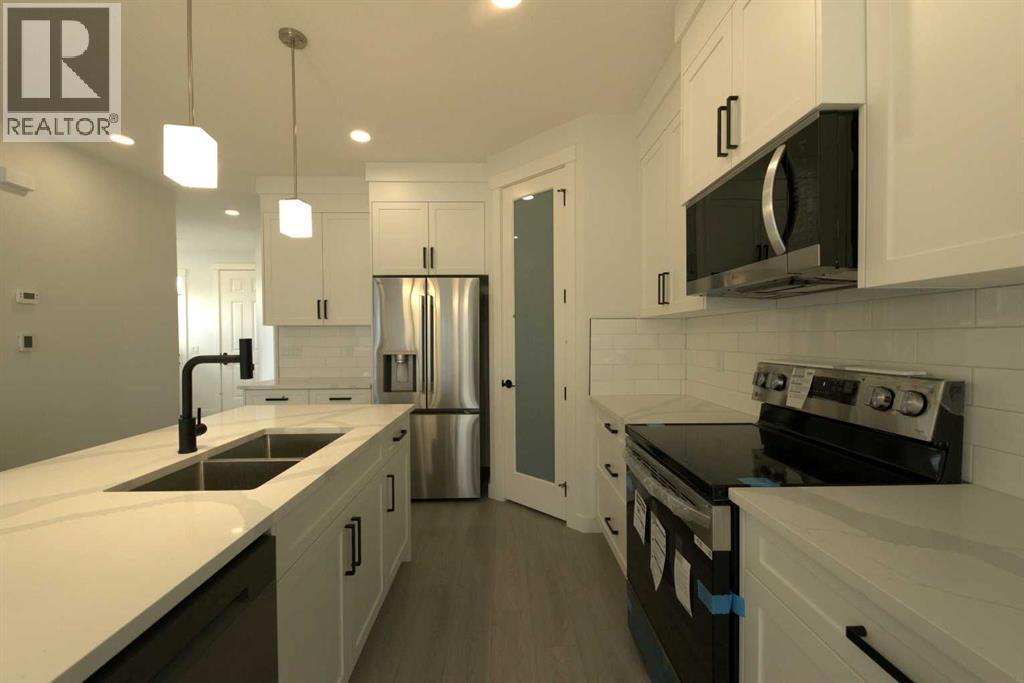 1117 Iron Ridge Avenue, Crossfield, Alberta  T0M 0S0 - Photo 16 - A2253391