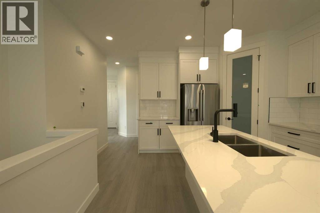 1117 Iron Ridge Avenue, Crossfield, Alberta  T0M 0S0 - Photo 9 - A2253391