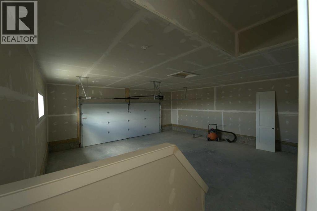 1117 Iron Ridge Avenue, Crossfield, Alberta  T0M 0S0 - Photo 4 - A2253391