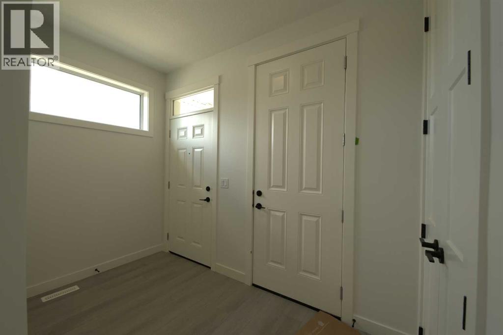 1117 Iron Ridge Avenue, Crossfield, Alberta  T0M 0S0 - Photo 5 - A2253391