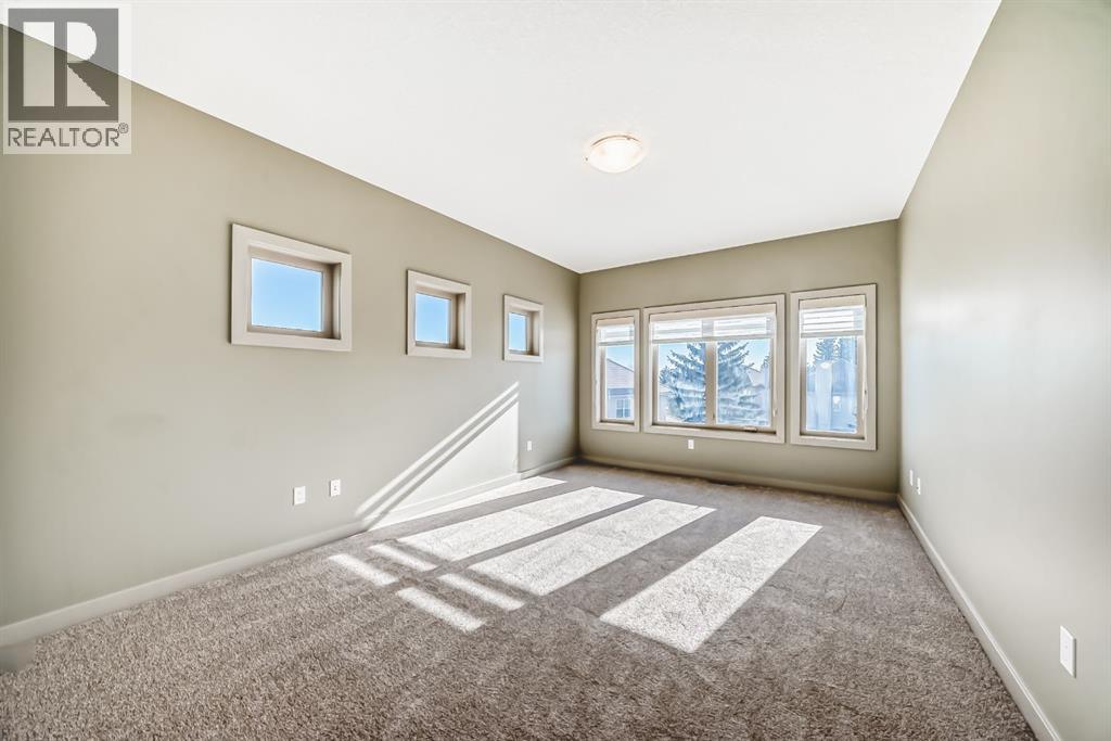 12 Cougar Ridge Landing Sw, Calgary, Alberta  T3H 0X8 - Photo 25 - A2263362