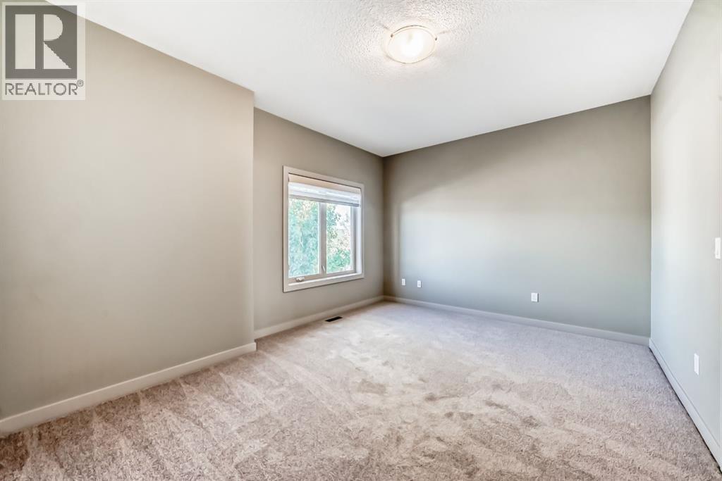 12 Cougar Ridge Landing Sw, Calgary, Alberta  T3H 0X8 - Photo 32 - A2263362