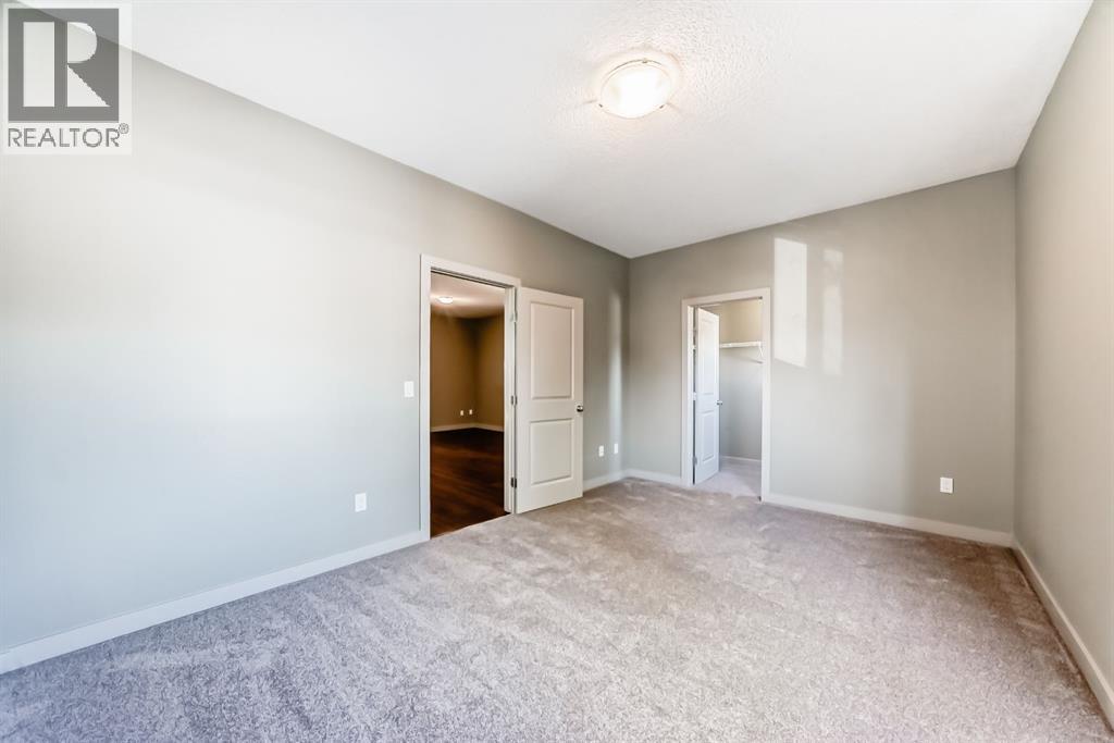 12 Cougar Ridge Landing Sw, Calgary, Alberta  T3H 0X8 - Photo 34 - A2263362