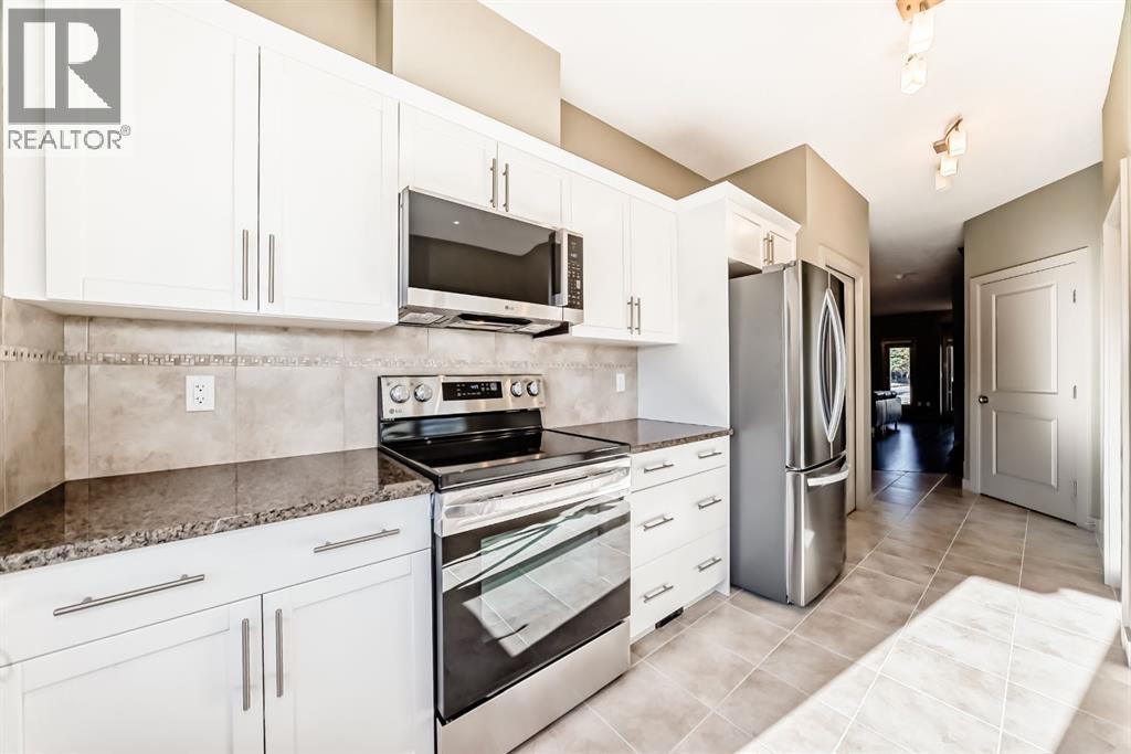 12 Cougar Ridge Landing Sw, Calgary, Alberta  T3H 0X8 - Photo 13 - A2263362