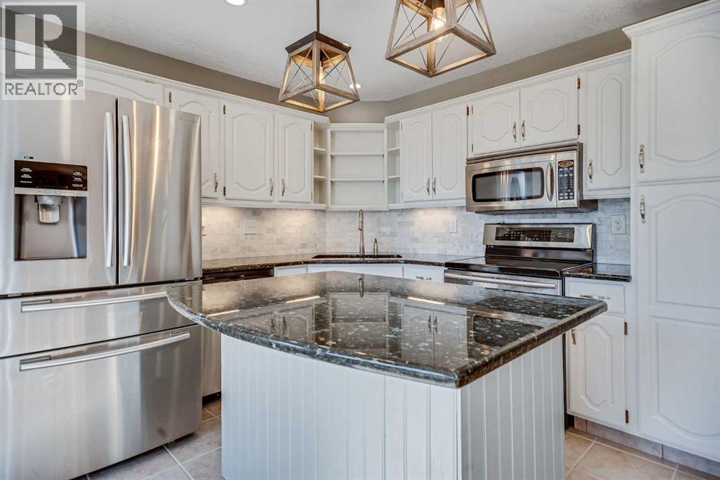 107 Wood Valley Drive Sw, Calgary, Alberta  T2W 5V6 - Photo 8 - A2262746
