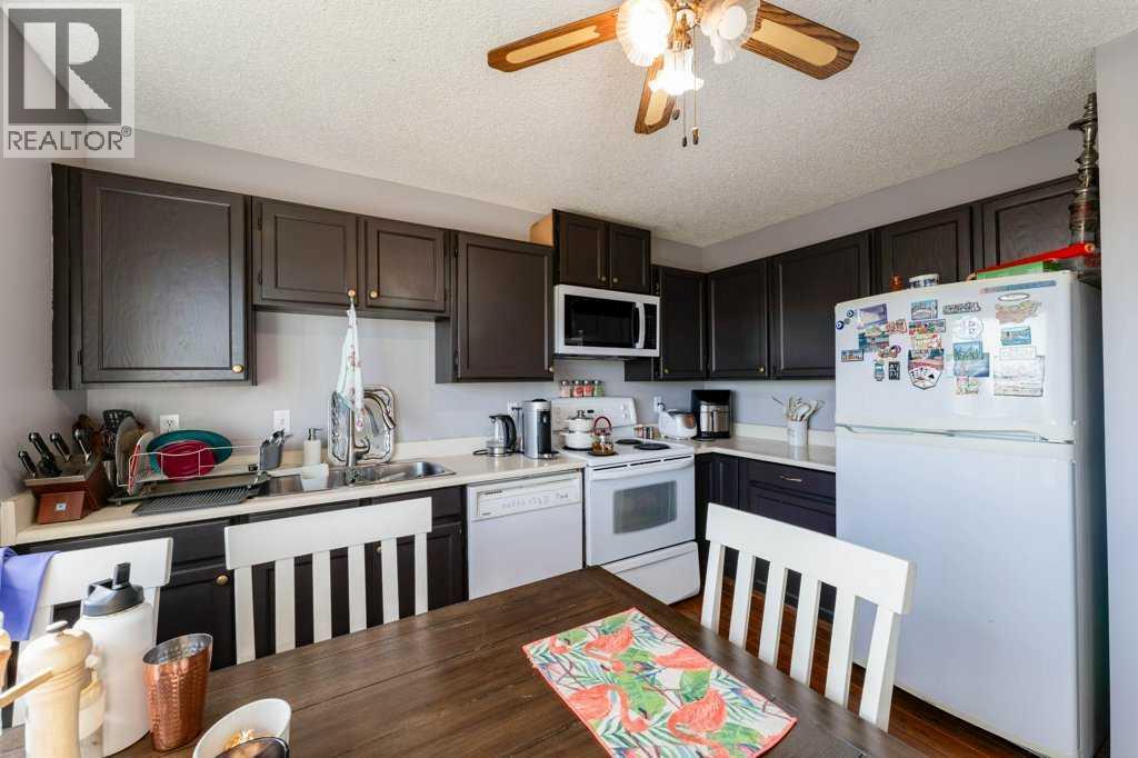 14 Macewan Park Road Nw, Calgary, Alberta  T3K 3g5 - Photo 7 - A2262155