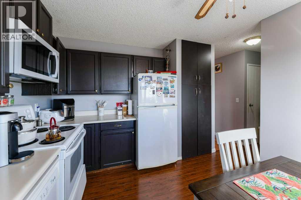 14 Macewan Park Road Nw, Calgary, Alberta  T3K 3g5 - Photo 8 - A2262155