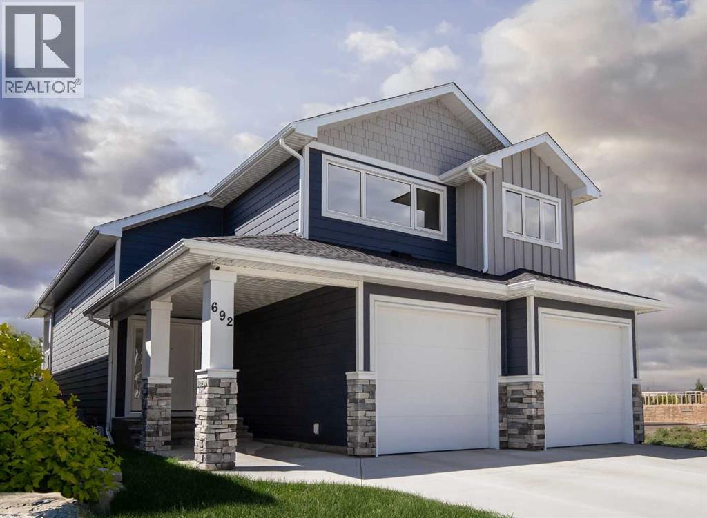 692 Sixmile Crescent S, Lethbridge, Alberta  T1K 8G3 - Photo 2 - A2258561