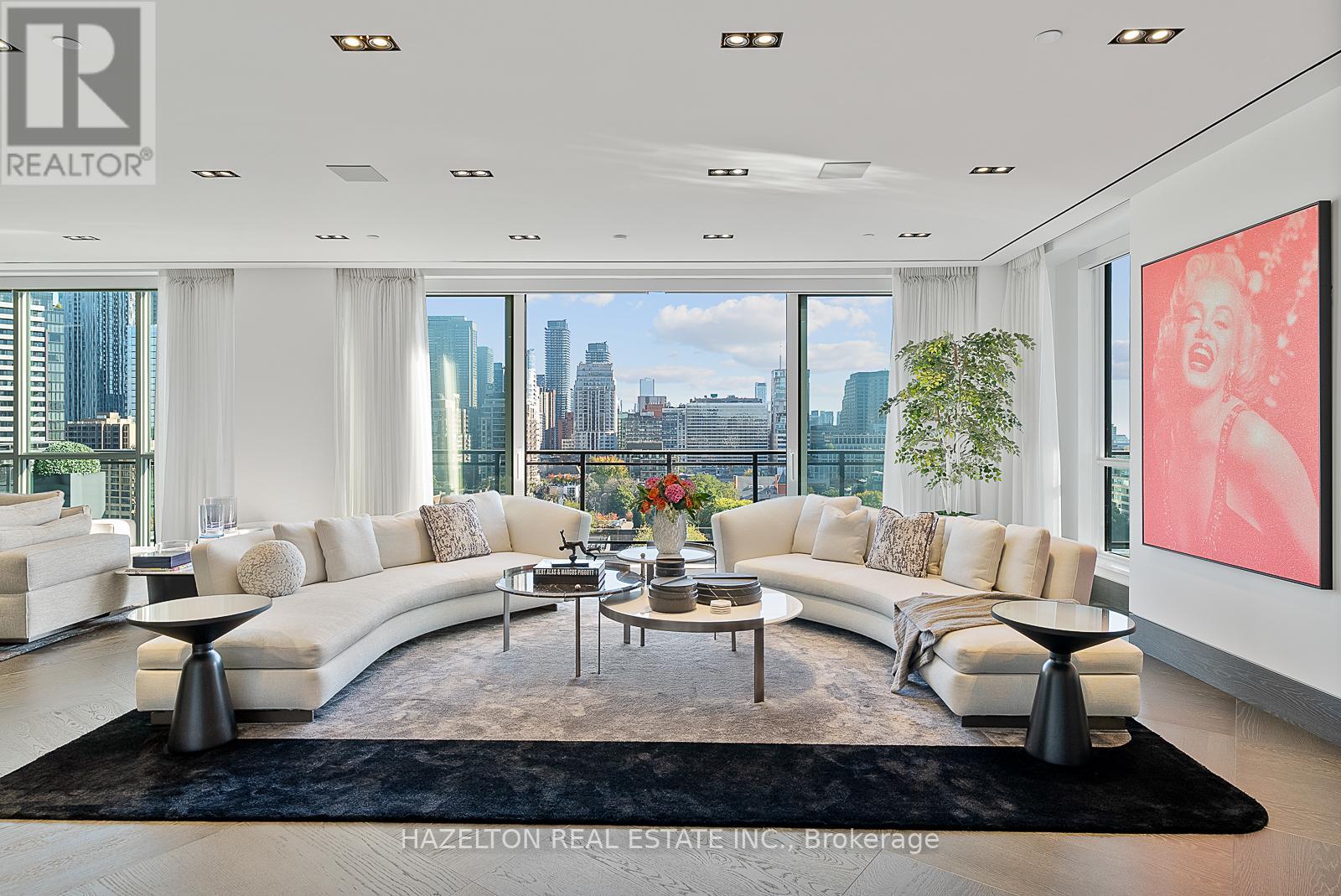The pinnacle of luxury living in a truly unique Penthouse, occupying the entire floor of an intimate boutique condominium building in Yorkville. This spectacular residence boasts fabulous panoramic views in every direction, offering a breathtaking perspective of the city skyline and the lush tree-lined streets below. Floor-to-ceiling windows bathe each room in natural light, with multiple balconies and terraces. Every detail has been meticulously curated and finished to the highest conceivable standard. Two direct elevators open directly into the private marble foyer . From custom millwork, premium  heated stone floors with  inlays,  and designer lighting to  smart home automation and premium architectural detail,  this penthouse showcases uncompromising quality and sophistication. Simply exceptional entertaining spaces with a wonderful grand sized 'great room' ,a wine lounge, even a separate gallery area. Ownership includes a separate one bedroom guest/nanny/office suite, accessed through a private elevator. Incredibly generous primary bedroom occupies an entire wing with TWO decadent marble ensuites and TWO fitted dressing rooms, and two more well sized bedrooms with their own ensuites and walk in closets. Plus a private rooftop terrace with outdoor kitchen and entertaining area with a gas fire table and outdoor TV.  This is  perfect blend of privacy, exclusivity, and convenience, with direct elevator access to the residence, private terraces, and ample space for both grand entertaining and tranquil relaxation. And Yorkville's renowned dining, shopping, and cultural amenities just steps away, this is a rare chance to own a signature home in the city's finest neighbourhood. (id:48254)