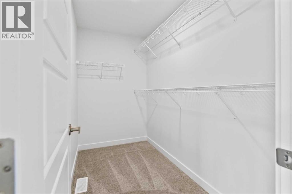 121 Creekstone Landing Sw, Calgary, Alberta  T2X 5E8 - Photo 28 - A2258100