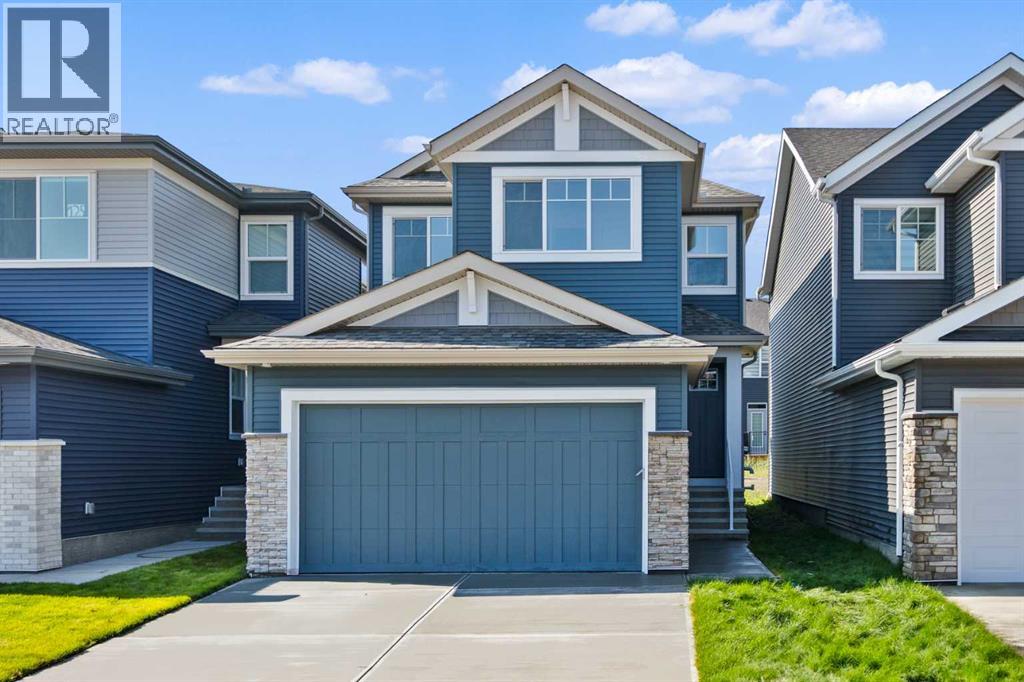 121 Creekstone Landing Sw, Calgary, Alberta  T2X 5E8 - Photo 1 - A2258100