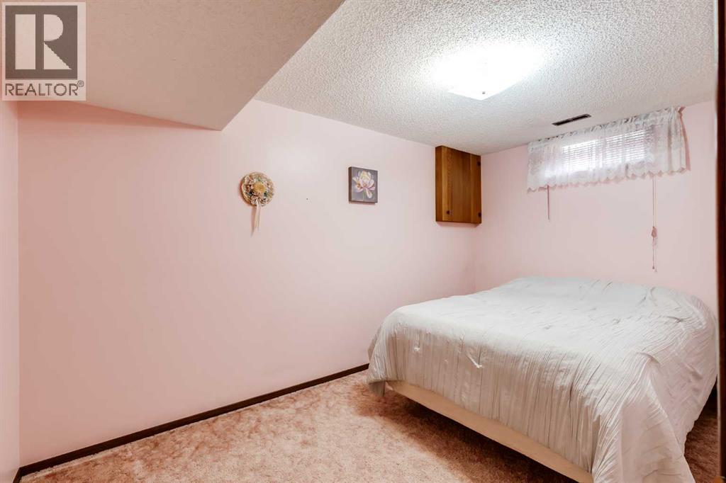 311 Midridge Road Se, Calgary, Alberta  T2X 1E1 - Photo 22 - A2263544