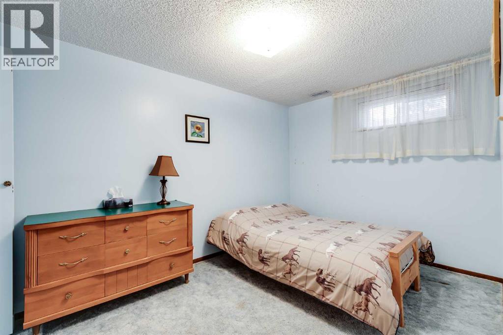311 Midridge Road Se, Calgary, Alberta  T2X 1E1 - Photo 25 - A2263544