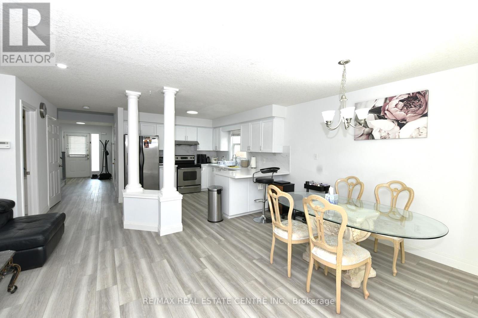260 Bridlewreath Street, Kitchener, Ontario  N2E 4B4 - Photo 4 - X12457465